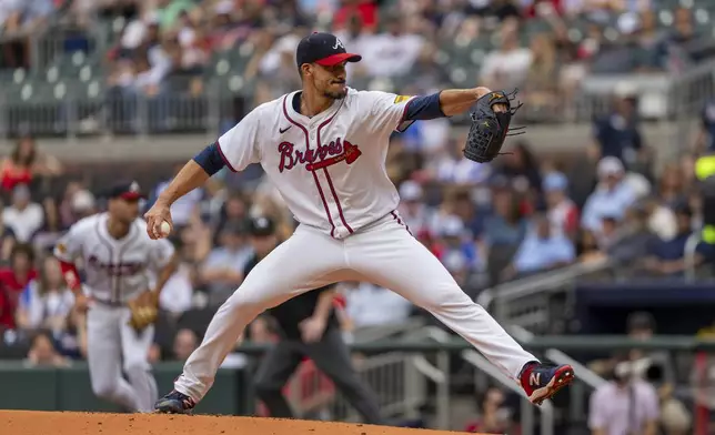 Atlanta Braves pitcher Charlie Morton throws in the first inning of a baseball game against the Kansas City Royals, Sunday, Sept. 29, 2024, in Atlanta. (AP Photo/Jason Allen)