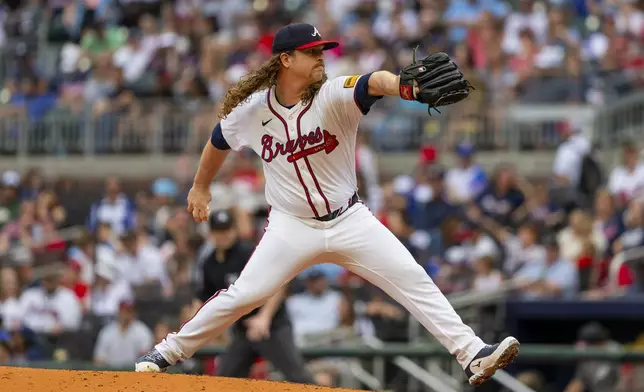 Atlanta Braves pitcher Grant Holmes throws in the fifth inning of a baseball game against the Kansas City Royals, Sunday, Sept. 29, 2024, in Atlanta. (AP Photo/Jason Allen)