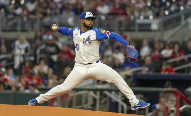 Atlanta Braves pitcher Reynaldo Lopez throws in the first inning of a baseball game against the Kansas City Royals, Saturday, Sept. 28, 2024, in Atlanta. (AP Photo/Jason Allen)