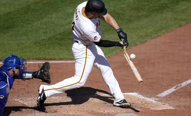 Pittsburgh Pirates' Joey Bart fouls off a pitch from Kansas City Royals relief pitcher Kris Bubic while breaking his bat during the eighth inning of a baseball game in Pittsburgh, Saturday, Sept. 14, 2024. (AP Photo/Gene J. Puskar)