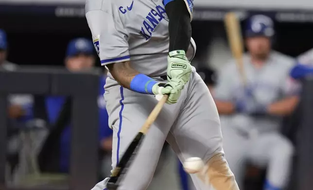 Kansas City Royals' Salvador Perez hits an RBI single during the fifth inning of a baseball game against the New York Yankees at Yankee Stadium, Tuesday, Sept. 10, 2024, in New York. (AP Photo/Seth Wenig)