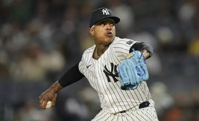 New York Yankees pitcher Marcus Stroman throws during the second inning of a baseball game against the Kansas City Royals at Yankee Stadium, Tuesday, Sept. 10, 2024, in New York. (AP Photo/Seth Wenig)