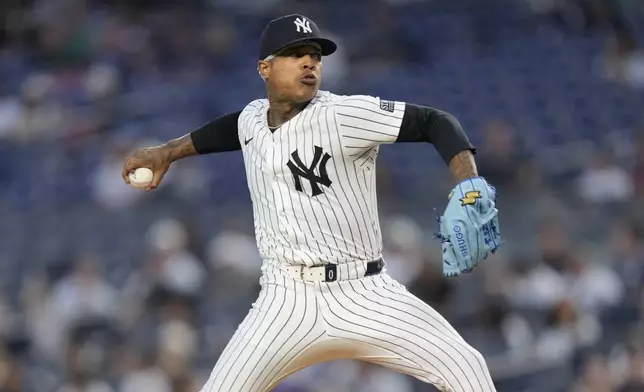 New York Yankees pitcher Marcus Stroman throws during the first inning of a baseball game against the Kansas City Royals at Yankee Stadium, Tuesday, Sept. 10, 2024, in New York. (AP Photo/Seth Wenig)