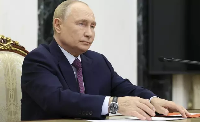 Russian President Vladimir Putin speaks at the Security Council meeting on nuclear deterrence at the Kremlin in Moscow, Russia, Wednesday, Sept. 25, 2024. (Alexander Kazakov, Sputnik, Kremlin Pool Photo via AP)