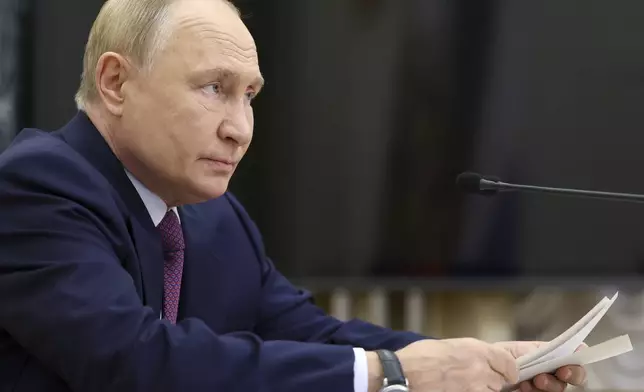 Russian President Vladimir Putin leads the Security Council meeting on nuclear deterrence at the Kremlin in Moscow, Russia, Wednesday, Sept. 25, 2024. (Alexander Kazakov, Sputnik, Kremlin Pool Photo via AP)