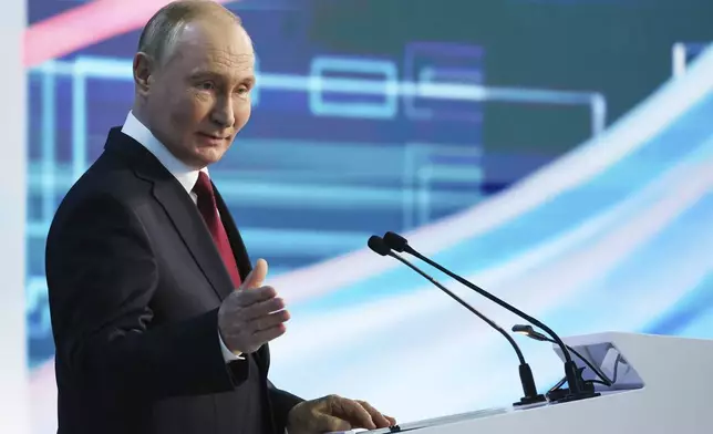 Russian President Vladimir Putin speaks at the Russian Energy Week International Forum in Moscow, Russia, Thursday, Sept. 26, 2024. (Alexander Kazakov, Sputnik, Kremlin Pool Photo via AP)