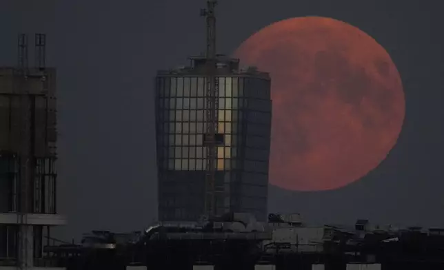 A supermoon rises in Moscow, Russia, Tuesday, Sept. 17, 2024. (AP Photo/Pavel Bednyakov)