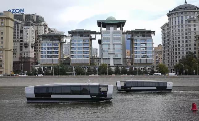 Boats float past the British Embassy building in Moscow, Russia, Friday, Sept. 13, 2024. (AP Photo)