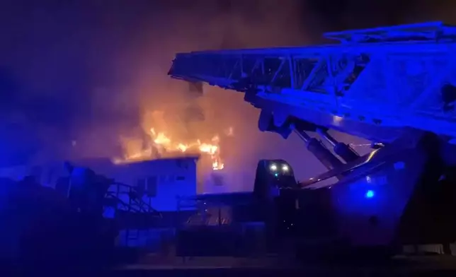 In this photo released by Belgorod Regional Governor Vyacheslav Gladkov's Telegram channel on Friday, Aug. 30, 2024, firefighters extinguish fire after a missile attack by the Armed Forces of Ukraine on the city of Belgorod and the Belgorod region. (Belgorod Regional Governor Vyacheslav Gladkov's Telegram channel via AP)