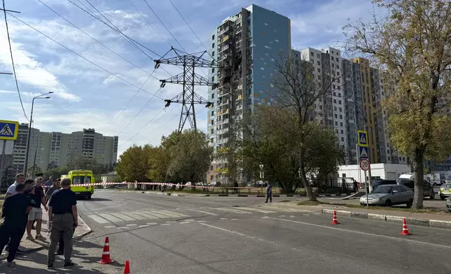 A view of the site of the damaged multi-storey residential building, following an alleged Ukrainian drone attack in Ramenskoye, outside Moscow, Moscow region, Russia, Tuesday, Sept. 10, 2024. (AP Photo)