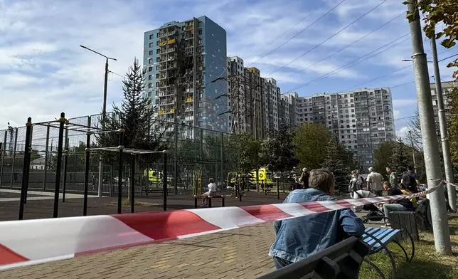 A view of the site of the damaged multi-storey residential building, following an alleged Ukrainian drone attack in Ramenskoye, outside Moscow, Moscow region, Russia, Tuesday, Sept. 10, 2024. (AP Photo)