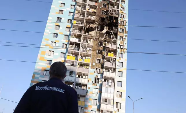 This photo released by Moscow Region Governor Andrei Vorobyev official telegram channel shows the site of the damaged multi-storey residential building following an alleged Ukrainian drone attack in Ramenskoye, outside Moscow, Moscow region, Russia, on Tuesday, Sept. 10, 2024. (Moscow Region Governor Andrei Vorobyev official telegram channel via AP)