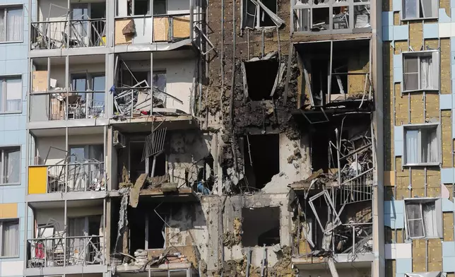 A view of the site of the damaged multi-storey residential building following an alleged Ukrainian drone attack in Ramenskoye, outside Moscow, Moscow region, Russia, on Tuesday, Sept. 10, 2024. (AP Photo)