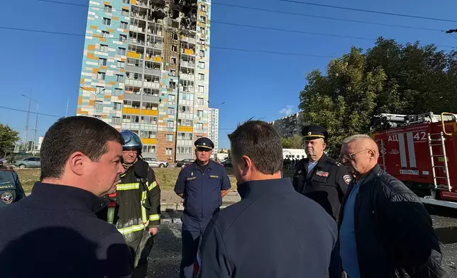 This photo released by Moscow Region Governor Andrei Vorobyev official telegram channel shows the site of the damaged multi-storey residential building following an alleged Ukrainian drone attack in Ramenskoye, outside Moscow, Moscow region, Russia, on Tuesday, Sept. 10, 2024. (Moscow Region Governor Andrei Vorobyev official telegram channel via AP)