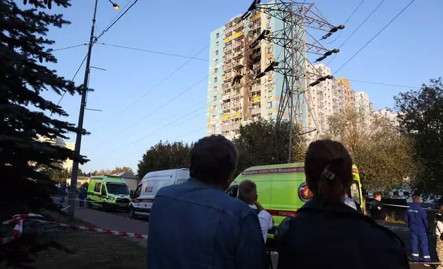 This photo released by Moscow Region Governor Andrei Vorobyev official telegram channel shows the site of the damaged multi-storey residential building following an alleged Ukrainian drone attack in Ramenskoye, outside Moscow, Moscow region, Russia, on Tuesday, Sept. 10, 2024. (Moscow Region Governor Andrei Vorobyev official telegram channel via AP)