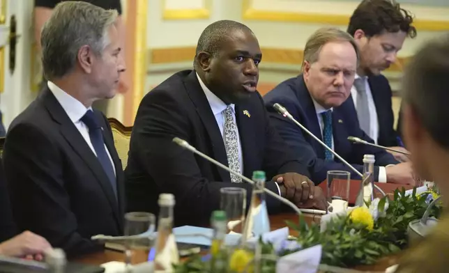 Britain's Foreign Secretary David Lammy speaks during a meeting with U.S. Secretary of State Antony Blinken and Ukraine's President Volodymyr Zelenskyy at the Mariinsky Palace in Kyiv, Ukraine, Wednesday, Sept. 11, 2024. (AP Photo/Mark Schiefelbein, Pool)