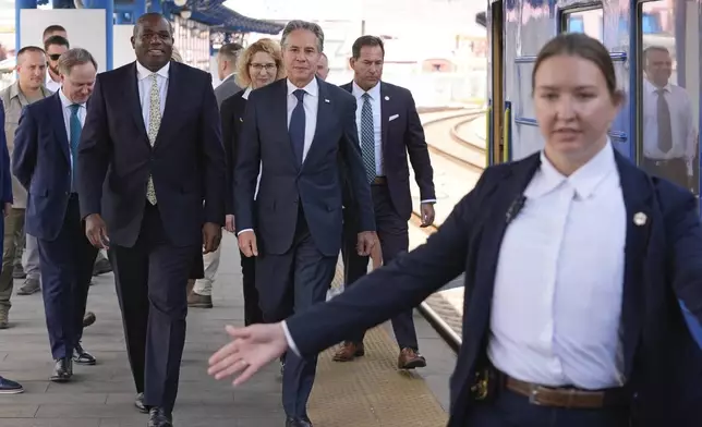 U.S. Secretary of State Antony Blinken and British Foreign Secretary David Lammy arrive at the train station in Kyiv, Ukraine, Wednesday, Sept. 11, 2024. (AP Photo/Mark Schiefelbein, Pool)