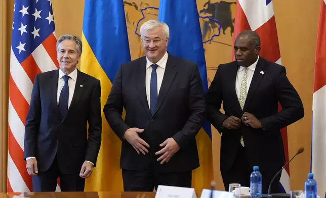 U.S. Secretary of State Antony Blinken, left, and Britain's Foreign Secretary David Lammy meet with Ukraine's Foreign Minister Andriiy Sybiha at the Ministry of Foreign Affairs in Kyiv, Ukraine, Wednesday, Sept. 11, 2024. (AP Photo/Mark Schiefelbein, Pool)