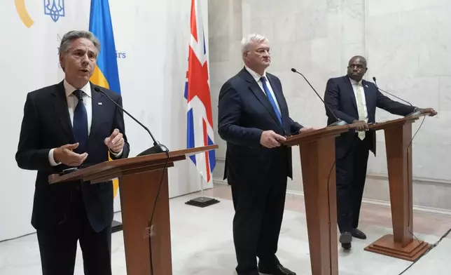 U.S. Secretary of State Antony Blinken, left, speaks as he stands with Britain's Foreign Secretary David Lammy, and Ukraine's Foreign Minister Andriiy Sybiha, center, during a joint news conference at the Ministry of Foreign Affairs in Kyiv, Ukraine, Wednesday, Sept. 11, 2024. (AP Photo/Efrem Lukatsky)