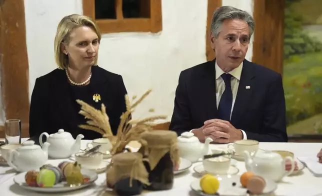 U.S. Secretary of State Antony Blinken and U.S. Ambassador to Ukraine Bridget Brink attend an event to promote civil society engagement in Kyiv, Ukraine, Wednesday, Sept. 11, 2024. (AP Photo/Mark Schiefelbein, Pool)