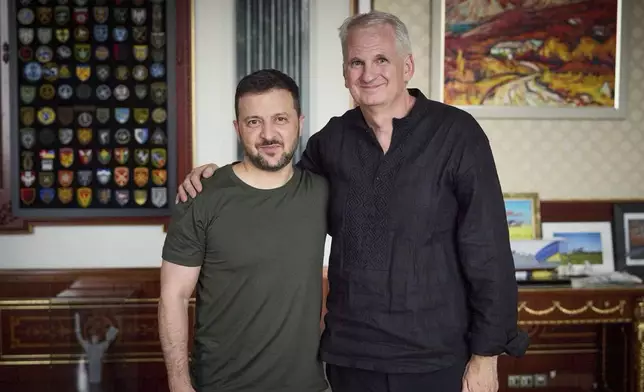 In this photo provided by the Ukrainian Presidential Press Office on Sept. 10, 2024, U.S. historian and author Timothy Snyder, right, meets President of Ukraine Volodymyr Zelenskyy, in Kyiv, Ukraine. (Ukrainian Presidential Press Office via AP)