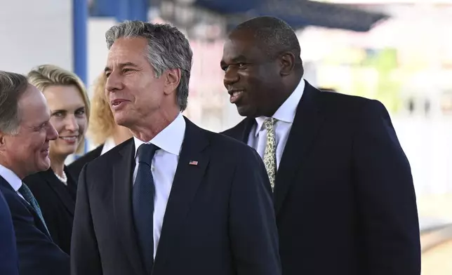 British Foreign Secretary David Lammy, right. and US Secretary of State, Anthony Blinken arrive at Kyiv train station Wednesday, Sept. 11, 2024 in Kyiv, Ukraine. The British Foreign Secretary joined his American counterpart on a visit to Ukraine to discuss the country's military needs in its fight against Russia. (Leon Neal/Pool via AP)