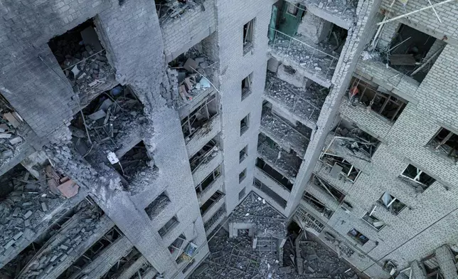 A residential building is seen heavily damaged after a Russian airstrike in Kramatorsk, Donetsk region, Ukraine, Wednesday, Sept. 25, 2024. (AP Photo/Evgeniy Maloletka)