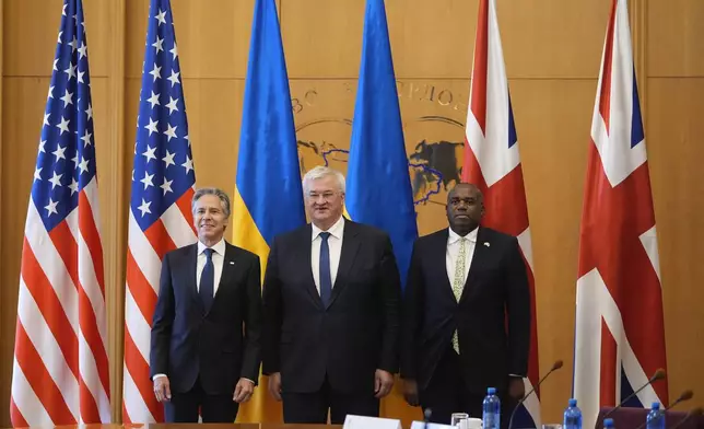 U.S. Secretary of State Antony Blinken, left, and Britain's Foreign Secretary David Lammy meet with Ukraine's Foreign Minister Andriiy Sybiha at the Ministry of Foreign Affairs in Kyiv, Ukraine, Wednesday, Sept. 11, 2024. (AP Photo/Mark Schiefelbein, Pool)