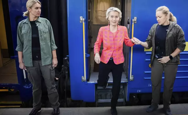 President of the European Commission, Ursula von der Leyen arrives at the railway station in Kyiv, Ukraine, Friday, Sept. 20, 2024. (Christoph Soeder, Pool via AP)