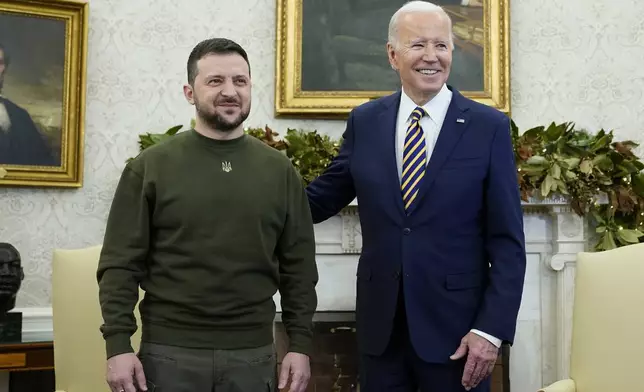 FILE - President Joe Biden meets with Ukrainian President Volodymyr Zelenskyy in the Oval Office of the White House, Wednesday, Dec. 21, 2022, in Washington. (AP Photo/Patrick Semansky, File)