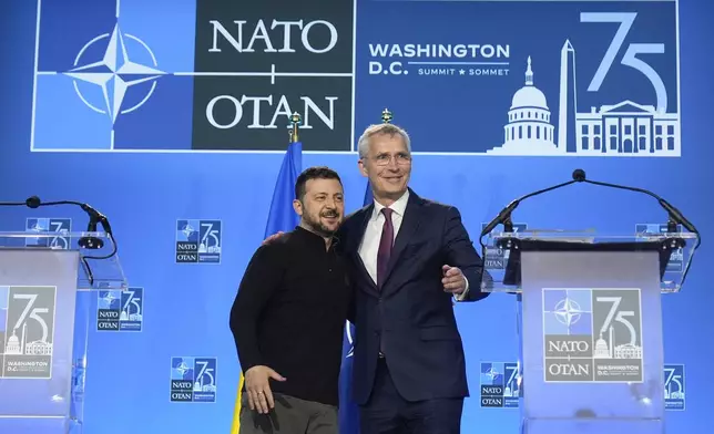 FILE - Ukraine's President Volodymyr Zelenskyy and NATO Secretary General Jens Stoltenberg wrap up a joint press conference at the NATO summit in Washington, Thursday, July 11, 2024. (AP Photo/Mark Schiefelbein, File)