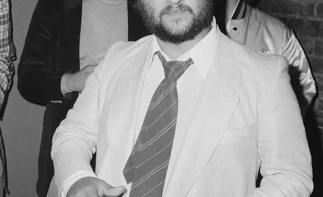 FILE - Actor John Belushi appears at the opening night party for "Animal House" at the Village Gate in New York on July 27, 1978. Belushi died March 5, 1982, at 33 after overdosing at the Chateau Marmont in Los Angeles. (AP Photo, File)