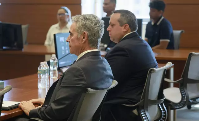 Tom Hoyer listens to testimony in court on Thursday, Sept. 5, 2024, Broward County, Fla. Tom Hoyer's son Luke was killed in the mass shooting at Marjory Stoneman Douglas High School on Valentine's Day 2018. The families of the Parkland victims are in court to debate whether one plaintiff, the family of Anthony Borges, has the right to unilaterally negotiate a settlement entitling him to the rights to Nikolas Cruz's name and inheritance. (Mike Stocker/South Florida Sun Sentinel) /South Florida Sun-Sentinel via AP)