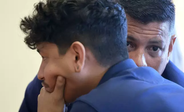 Anthony Borges listens to testimony in Judge Carol-Lisa Phillips' courtroom on Thursday, Sept. 5, 2024, in Broward County, Fla. Borges was shot five times in the mass shooting at Marjory Stoneman Douglas High School on Valentine's Day 2018. The families of the Parkland victims are in court to debate whether one plaintiff, the family of Anthony Borges, has the right to unilaterally negotiate a settlement entitling him to the rights to Nikolas Cruz's name and inheritance. (Mike Stocker /South Florida Sun-Sentinel via AP)