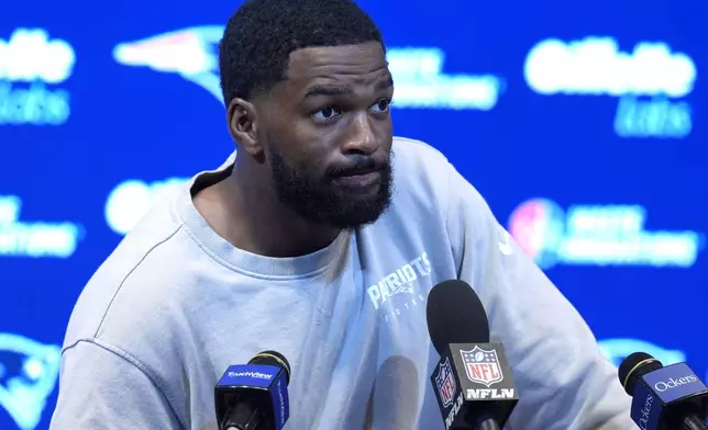 New England Patriots quarterback Jacoby Brissett speaks with reporters following an NFL football game against the Seattle Seahawks, Sunday, Sept. 15, 2024, in Foxborough, Mass. (AP Photo/Michael Dwyer)