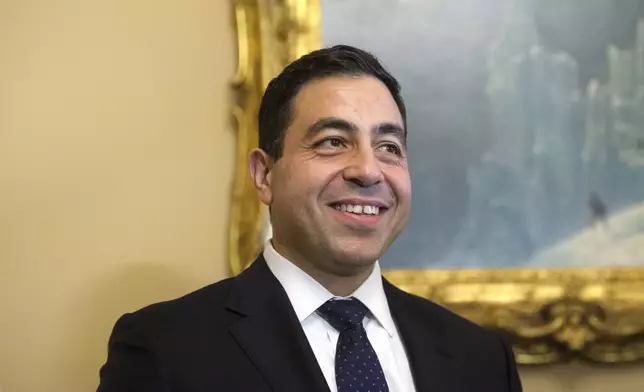 Senator-designee George Helmy, D-N.J., waits to meet with Senate Majority Leader Chuck Schumer, D-N.Y., prior to taking the oath of office in the Old Senate Chamber at the Capitol in Washington, Monday, Sept. 9, 2024. (AP Photo/Rod Lamkey, Jr.)