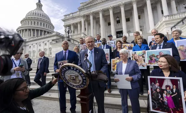 Senate Majority Leader Chuck Schumer, D-NY, center, accompanied by Sen. Cory Booker, D-NJ., left, Sen. Patty Murray, D-Wash., center-right, and Sen. Tammy Duckworth, D-Ill., right, speaks about the need to protect rights to in vitro fertilization (IVF), on the Senate steps at Capitol in Washington, Tuesday, Sept. 17, 2024. (AP Photo/Ben Curtis)