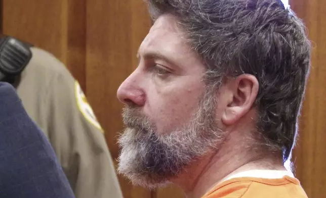 FILE - Ian Cramer listens to state District Judge Bobbi Weiler during his court appearance, April 17, 2024, at the McLean County Courthouse in Washburn, N.D. (AP Photo/Jack Dura, file)