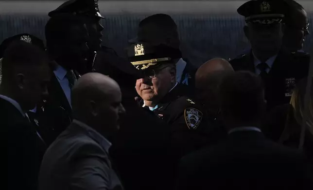 NYPD assistant chief chaplain Robert J. Romano attends the 9/11 Memorial ceremony on the 23rd anniversary of the Sept. 11, 2001 terror attacks, Wednesday, Sept. 11, 2024, in New York. (AP Photo/Pamela Smith)