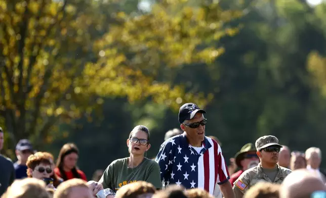 Visitors listen during the Bells of Remembrance at the Flight 93 National Memorial on the 23rd anniversary of the Sept. 11 attacks in Shanksville, Pa., Wednesday, Sept. 11, 2024. (AP Photo/Jared Wickerham)