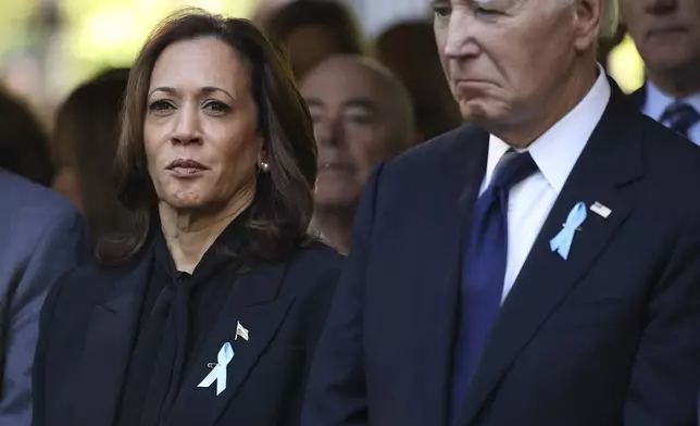 Democratic presidential nominee Vice President Kamala Harris and President Joe Biden attend the 9/11 Memorial ceremony on the 23rd anniversary of the Sept. 11, 2001 terror attacks, Wednesday, Sept. 11, 2024, in New York. (AP Photo/Yuki Iwamura)