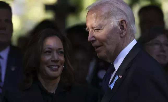 Democratic presidential nominee Vice President Kamala Harris and President Joe Biden arrive at the 9/11 Memorial ceremony on the 23rd anniversary of the Sept. 11, 2001 terror attacks, Wednesday, Sept. 11, 2024, in New York. (AP Photo/Yuki Iwamura)