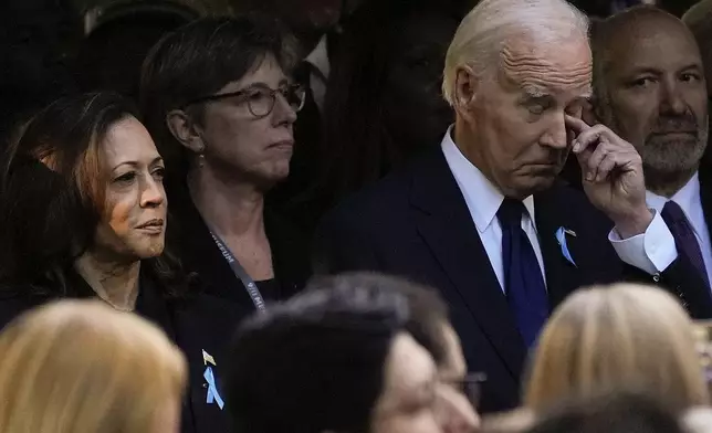 President Joe Biden and Democratic presidential nominee Vice President Kamala Harris attend the 9/11 Memorial ceremony on the 23rd anniversary of the Sept. 11, 2001 terror attacks, Wednesday, Sept. 11, 2024, in New York. (AP Photo/Pamela Smith)