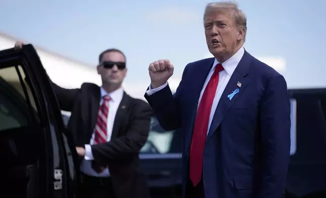 Republican presidential nominee former President Donald Trump arrives in Johnstown, Pa., en route to the Flight 93 Memorial, Wednesday, Sept. 11, 2024. (AP Photo/Matt Rourke)