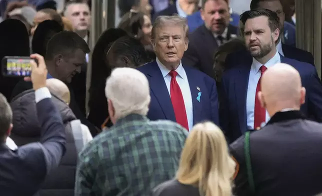 Republican presidential nominee former President Donald Trump and Republican vice presidential nominee Sen. JD Vance, R-Ohio, arrive for the 9/11 Memorial ceremony on the 23rd anniversary of the Sept. 11, 2001 terror attacks, Wednesday, Sept. 11, 2024, in New York. (AP Photo/Pamela Smith)