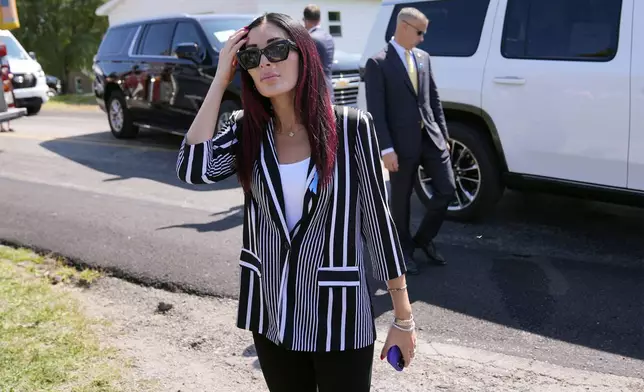 Laura Loomer arrives with Republican presidential nominee former President Donald Trump for a visit to the Shanksville Volunteer Fire Company in Shanksville, Pa., Wednesday, Sept. 11, 2024. (AP Photo/Matt Rourke)