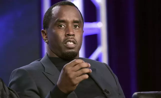 FILE -Sean 'Diddy' Combs participates in "The Four" panel during the FOX Television Critics Association Winter Press Tour in Pasadena, Calif., Jan. 4, 2018. (Photo by Richard Shotwell/Invision/AP, File)