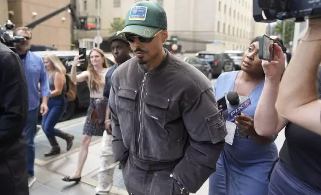 Quincy Brown leaves Manhattan federal court after his father, Sean "Diddy" Combs, was ordered held without bail in his federal sex trafficking case, Tuesday, Sept. 17, 2024, in New York. (AP Photo/Seth Wenig)