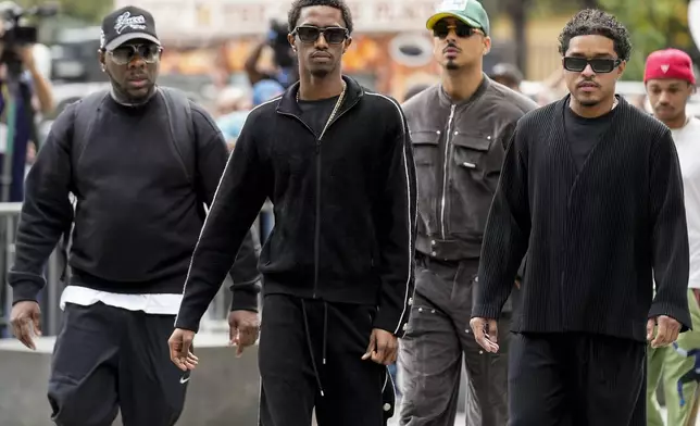 From right, Justin Dior Combs, Quincy Brown and King Combs, arrive at Manhattan federal court, Tuesday, Sept. 17, 2024, in New York. (AP Photo/Seth Wenig)