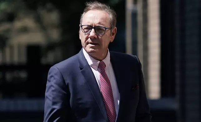 FILE - Actor Kevin Spacey walks outside Southwark Crown Court in London, July 26, 2023. (AP Photo/Alberto Pezzali, File)